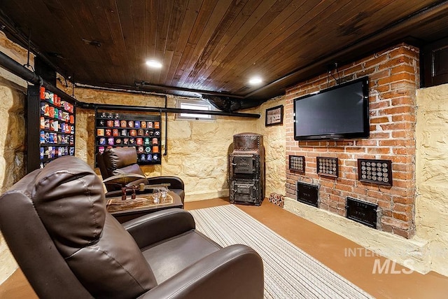 home theater room featuring wood ceiling