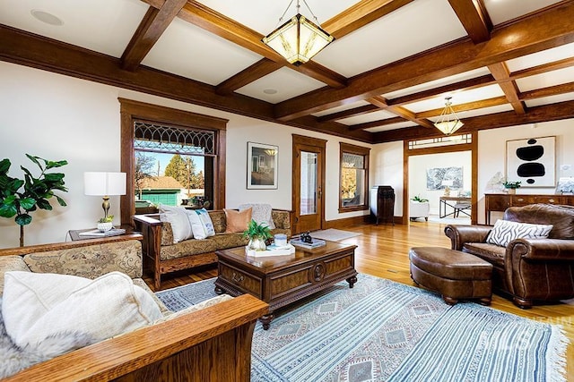 living room with coffered ceiling, light hardwood / wood-style flooring, and beamed ceiling