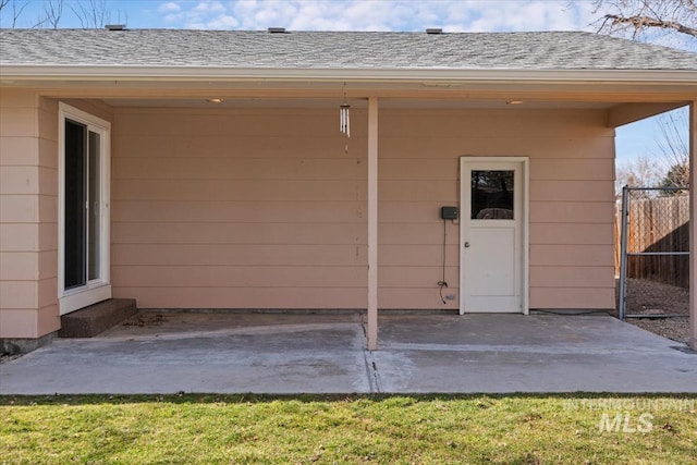 garage with fence