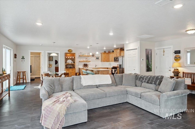403 Antonette Cir, Cascade, ID 83611 - living area with recessed lighting and a textured ceiling