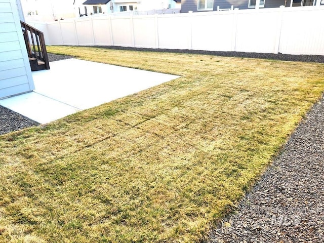 view of yard with a patio area