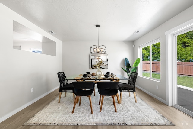19920 Lenape Ct, Caldwell, ID 83605 - dining area featuring light wood-style flooring and baseboards
