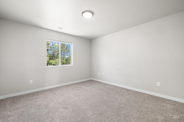 19920 Lenape Ct, Caldwell, ID 83605 - carpeted empty room with baseboards