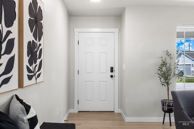 19920 Lenape Ct, Caldwell, ID 83605 - entrance foyer featuring light wood-type flooring and baseboards