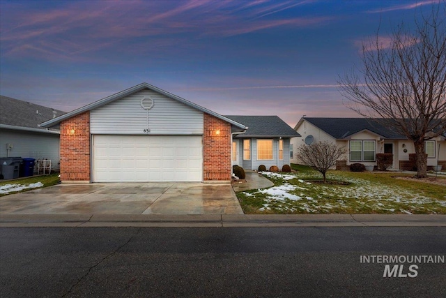 single story home featuring a garage