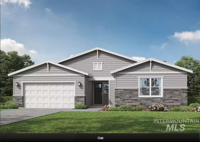 view of front of home with a garage and a front yard