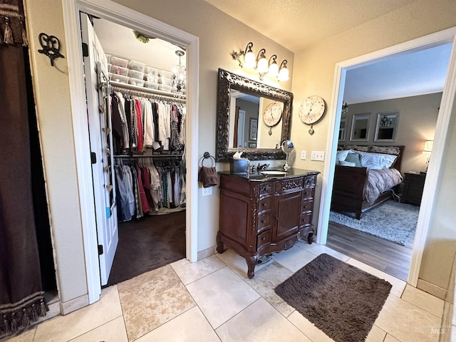 3195 N 3526e, Kimberly, ID 83341 - full bathroom with ensuite bath, vanity, tile patterned flooring, and a spacious closet