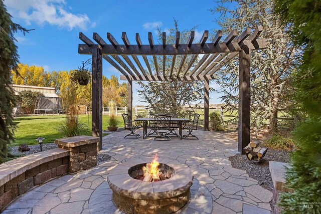 3195 N 3526e, Kimberly, ID 83341 - view of patio featuring a fire pit, outdoor dining space, and a pergola
