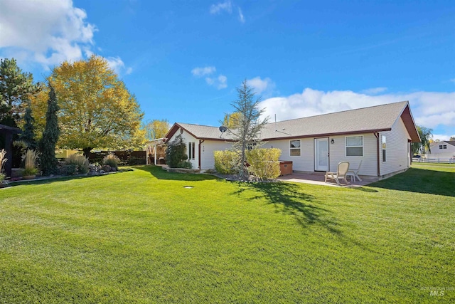 3195 N 3526e, Kimberly, ID 83341 - rear view of property featuring a patio area and a lawn