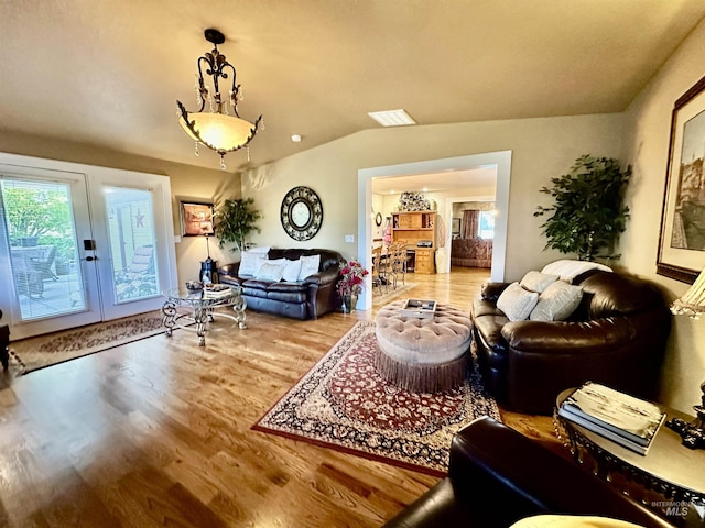 3195 N 3526e, Kimberly, ID 83341 - living area with french doors, wood finished floors, healthy amount of natural light, and vaulted ceiling
