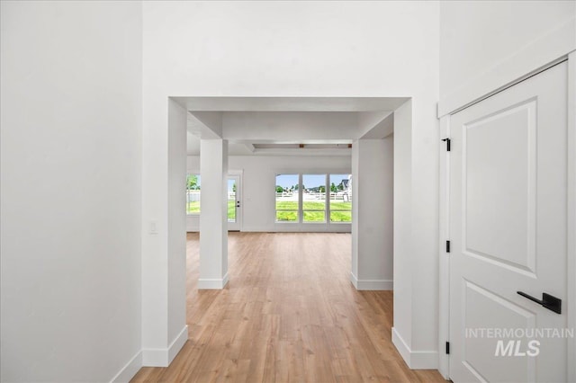 corridor featuring light wood-type flooring