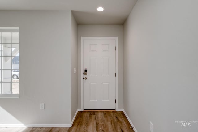 16888 Dunning Way, Caldwell, ID 83607 - doorway to outside with baseboards, wood finished floors, and recessed lighting