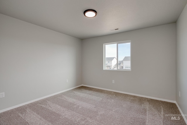 16888 Dunning Way, Caldwell, ID 83607 - unfurnished room featuring carpet floors, visible vents, and baseboards