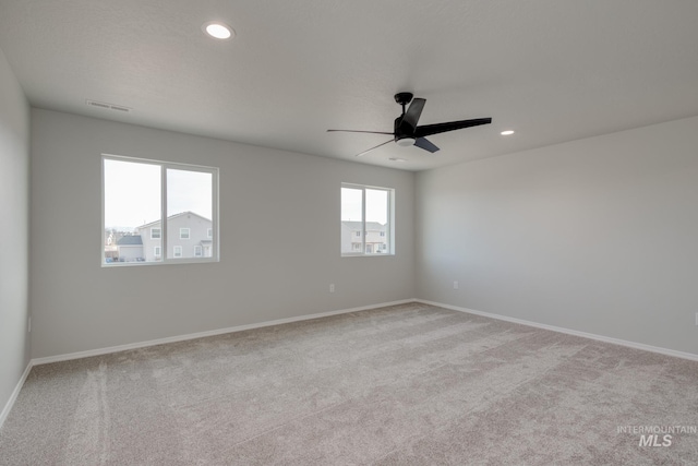 16888 Dunning Way, Caldwell, ID 83607 - spare room with a ceiling fan, light carpet, baseboards, visible vents, and recessed lighting