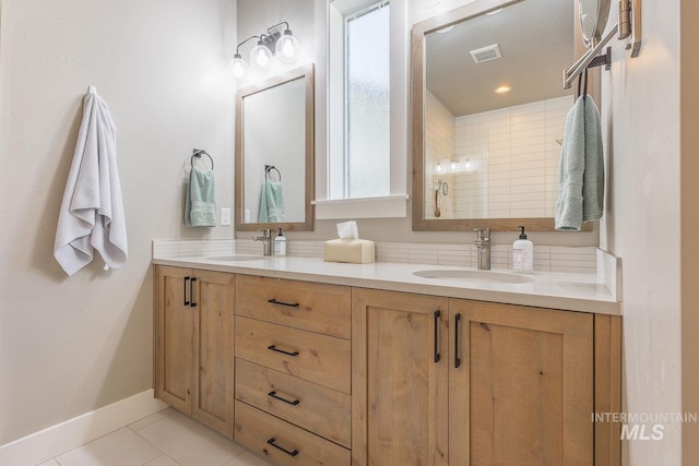 11706 W Lilium St, Star, ID 83669 - full bath with double vanity and tile patterned flooring