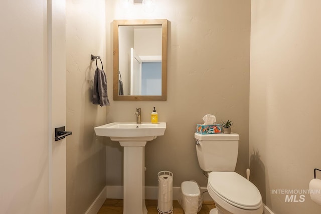 11706 W Lilium St, Star, ID 83669 - bathroom with toilet and baseboards