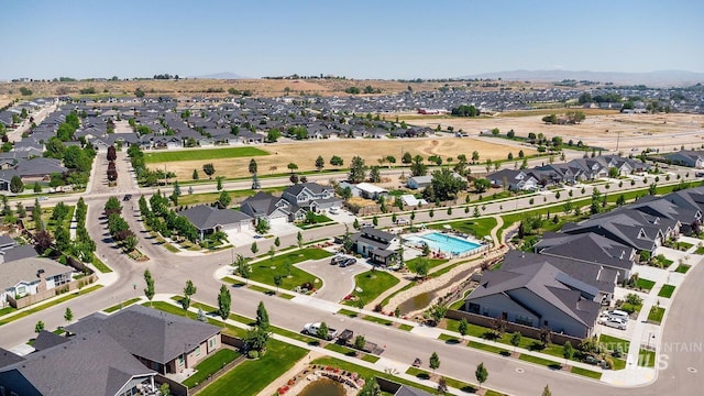 11706 W Lilium St, Star, ID 83669 - aerial view of property's location featuring nearby suburban area and a mountainous background