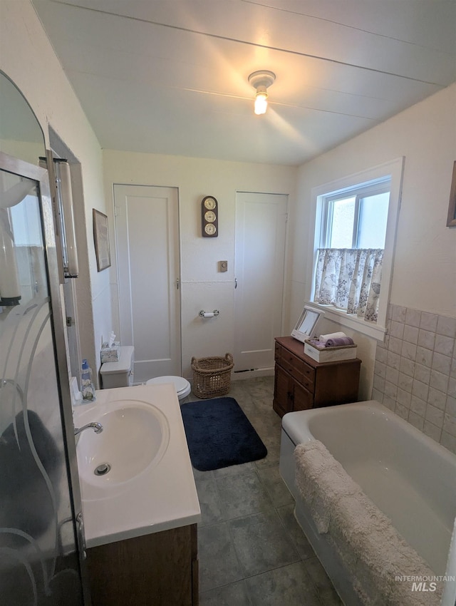 231 Willow Ave E, Fairfield, ID 83327 - full bath featuring a tub, vanity, and toilet