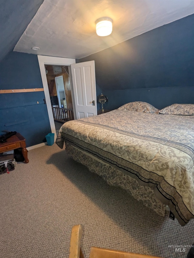 231 Willow Ave E, Fairfield, ID 83327 - bedroom featuring baseboards, carpet, and lofted ceiling