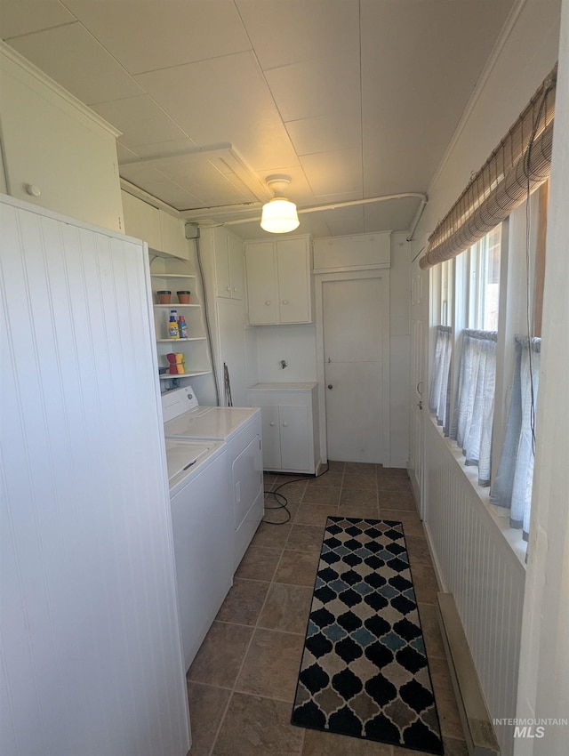 231 Willow Ave E, Fairfield, ID 83327 - washroom featuring washer and dryer and cabinet space