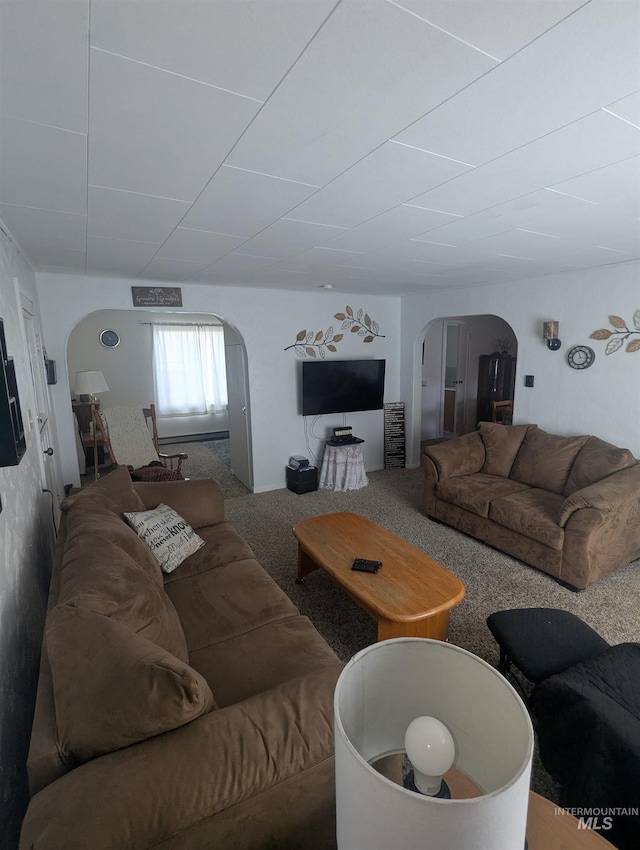 231 Willow Ave E, Fairfield, ID 83327 - living room with arched walkways and carpet