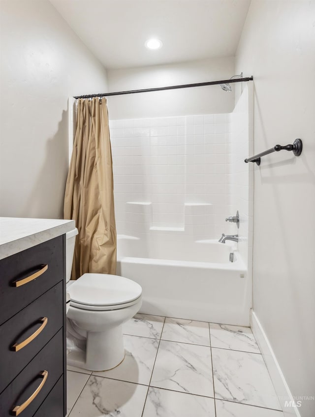 full bathroom featuring toilet, marble finish floor, shower / bath combination with curtain, baseboards, and vanity