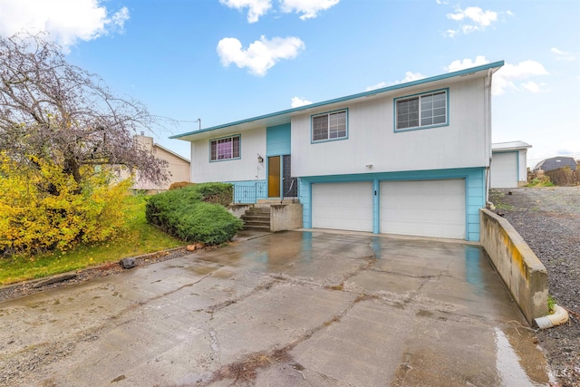 bi-level home featuring a garage