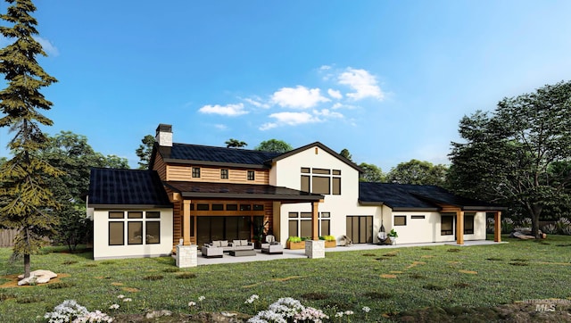 rear view of property with a lawn, a patio, and an outdoor hangout area