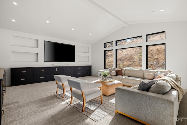 carpeted living room with built in features, high vaulted ceiling, and beam ceiling