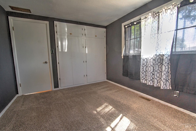 2912 S Harmony Ave, Boise, ID 83706 - unfurnished bedroom with carpet, baseboards, and a closet