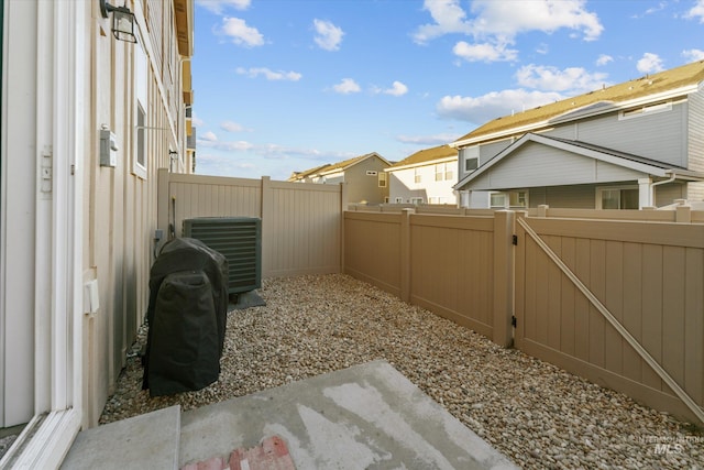 view of yard featuring central AC unit