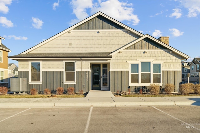 view of front of home featuring cooling unit