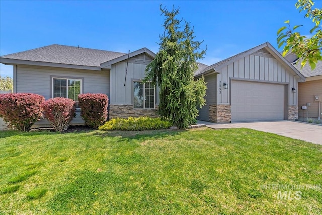 ranch-style house with board and batten siding, stone siding, a garage, and driveway