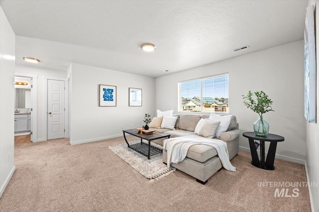 655 N Sevenoaks Ave, Eagle, ID 83616 - carpeted living room with baseboards
