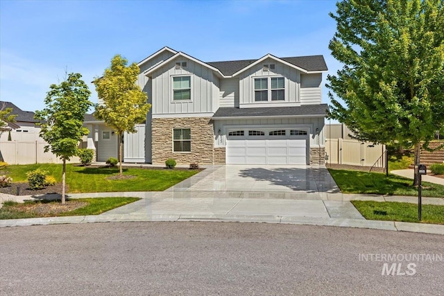655 N Sevenoaks Ave, Eagle, ID 83616 - view of front facade featuring stone siding, board and batten siding, concrete driveway, an attached garage, and a gate