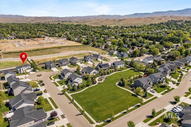 655 N Sevenoaks Ave, Eagle, ID 83616 - aerial view of residential area with a mountain backdrop