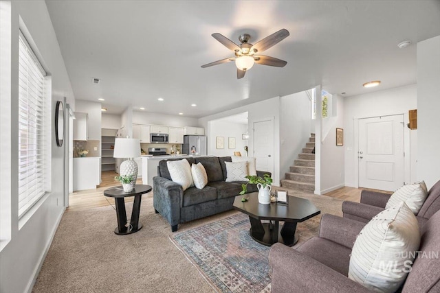 655 N Sevenoaks Ave, Eagle, ID 83616 - living area featuring plenty of natural light, stairs, a ceiling fan, baseboards, and recessed lighting