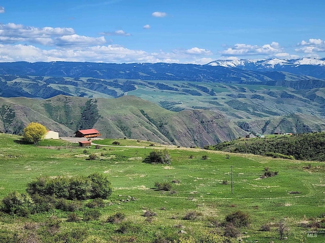 mountain view featuring a rural view