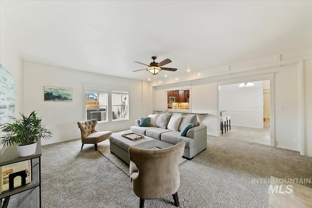 9874 W Whirlaway Ct, Boise, ID 83704 - living room featuring light carpet, ceiling fan, recessed lighting, and baseboards