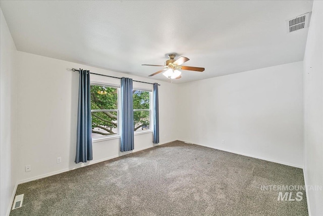 9874 W Whirlaway Ct, Boise, ID 83704 - carpeted spare room featuring a ceiling fan and baseboards