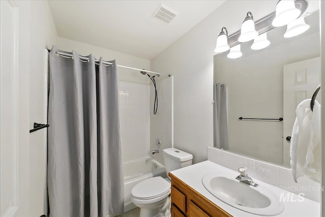 9874 W Whirlaway Ct, Boise, ID 83704 - bathroom with toilet, vanity, and shower / bathtub combination with curtain