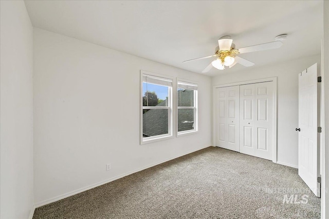 9874 W Whirlaway Ct, Boise, ID 83704 - unfurnished bedroom with carpet flooring, baseboards, a closet, and a ceiling fan