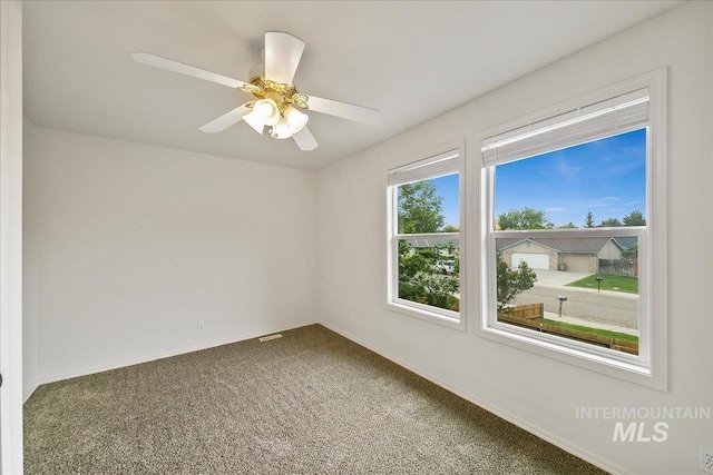 9874 W Whirlaway Ct, Boise, ID 83704 - unfurnished room featuring carpet, baseboards, and a ceiling fan