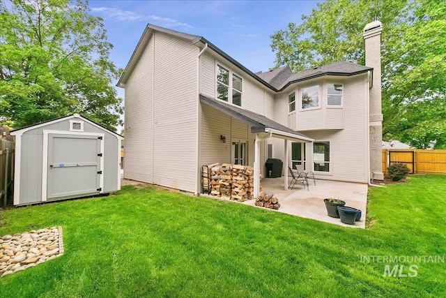 9874 W Whirlaway Ct, Boise, ID 83704 - rear view of property featuring a patio area and a chimney