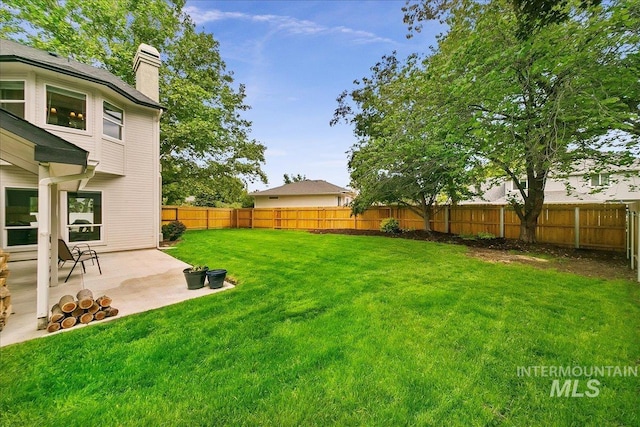9874 W Whirlaway Ct, Boise, ID 83704 - view of yard with a patio area