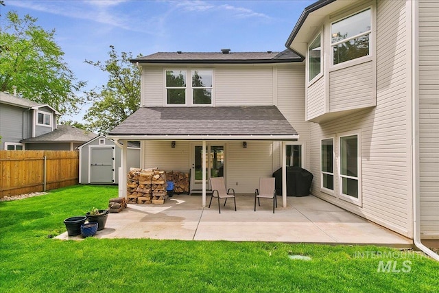9874 W Whirlaway Ct, Boise, ID 83704 - rear view of property featuring a patio area and a shingled roof