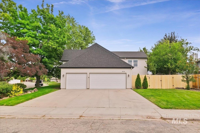 9874 W Whirlaway Ct, Boise, ID 83704 - view of property exterior with an attached garage, driveway, a gate, and roof with shingles