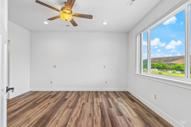 60 Appleford Ct, Asotin, WA 99402 - empty room with wood finished floors, recessed lighting, ceiling fan, and baseboards