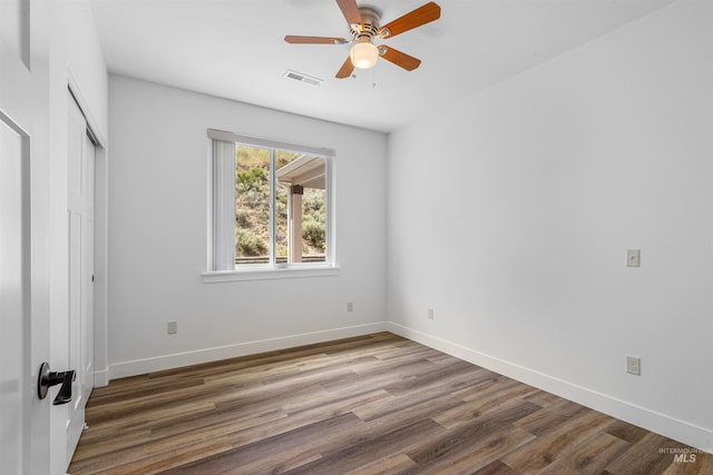 60 Appleford Ct, Asotin, WA 99402 - unfurnished bedroom featuring wood finished floors, baseboards, a closet, and a ceiling fan