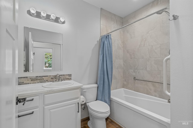 60 Appleford Ct, Asotin, WA 99402 - full bathroom featuring shower / bath combination with curtain, vanity, toilet, decorative backsplash, and wood finished floors